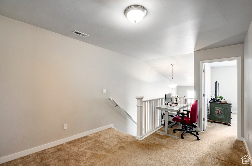 Home office featuring carpet floors