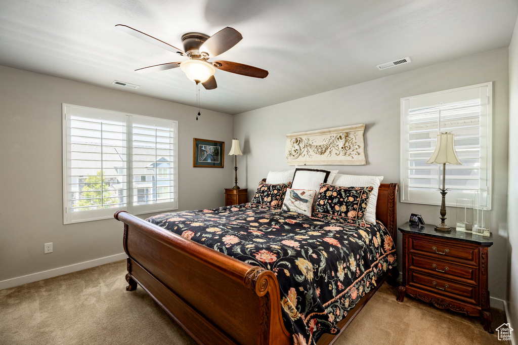 Bedroom featuring carpet flooring and ceiling fan