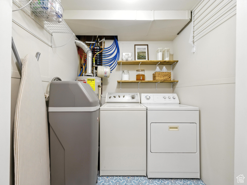 Laundry room with washing machine and dryer