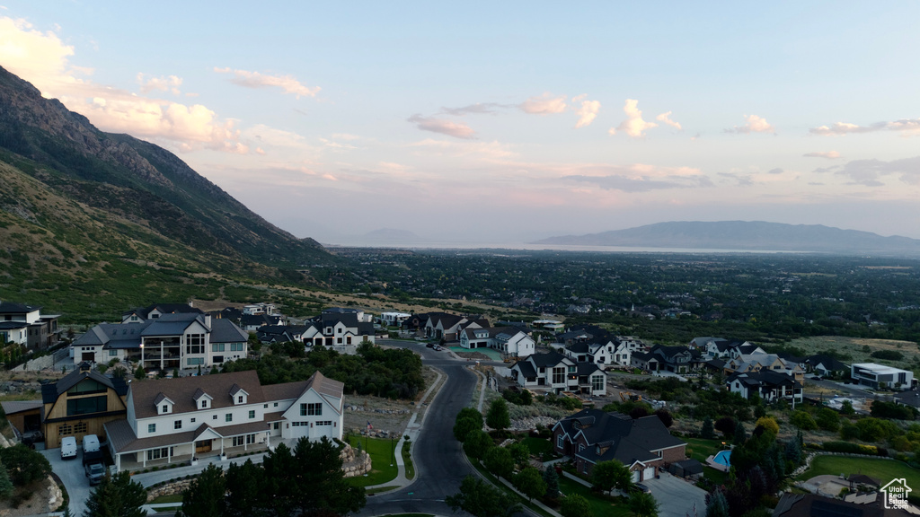 Aerial view at dusk of a mountain view and a residential view