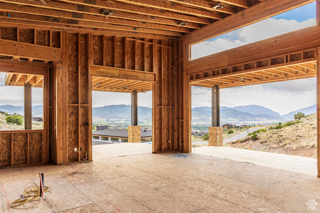 Miscellaneous room featuring a mountain view and healthy amount of natural light