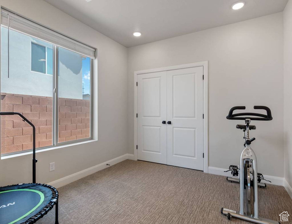 Exercise area featuring carpet and recessed lighting