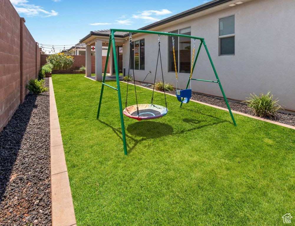 View of fenced backyard