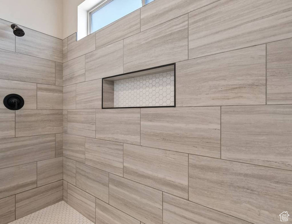 Bathroom with a tile shower