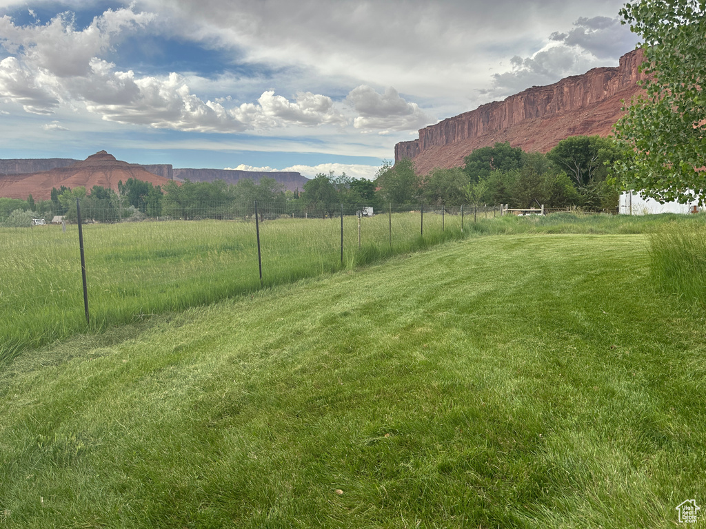 View of yard featuring a mountain view and a rural view