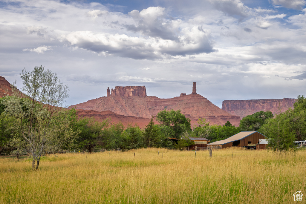 View of mountain backdrop featuring rural landscape