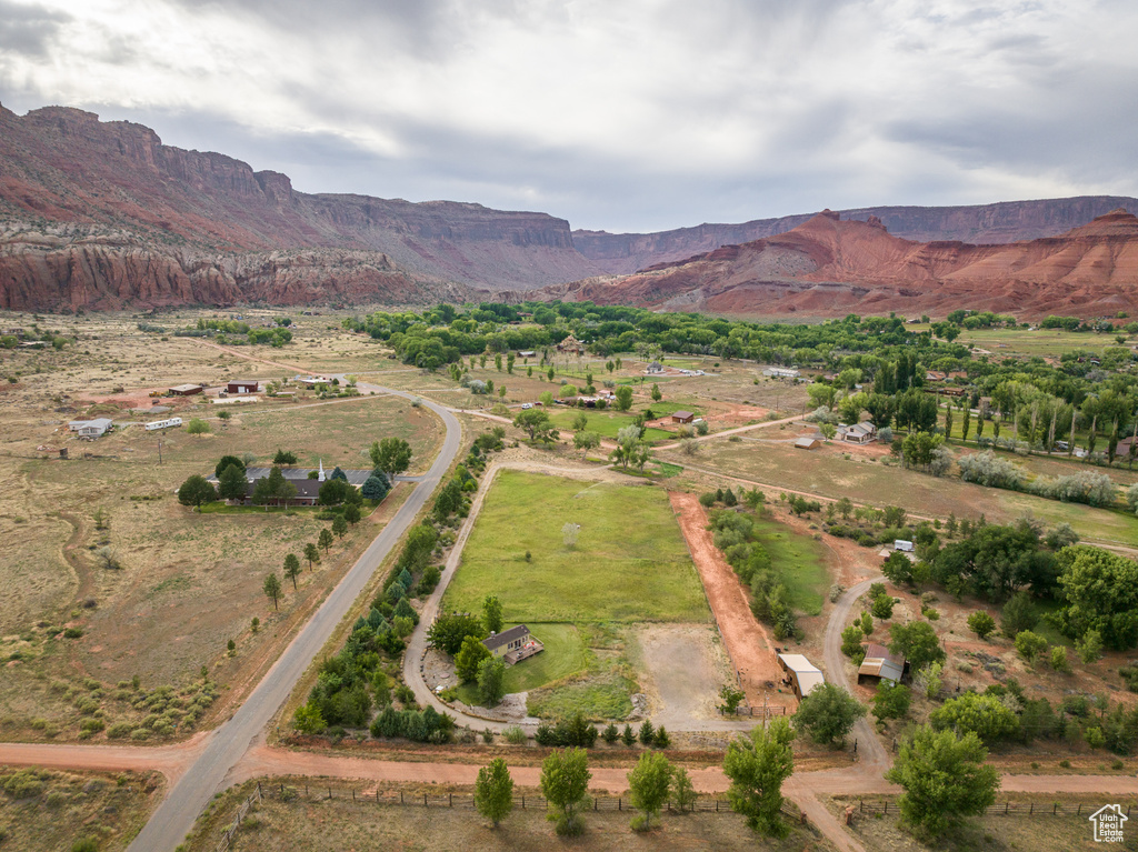 Aerial view of property\\\'s location with rural landscape and a mountain backdrop