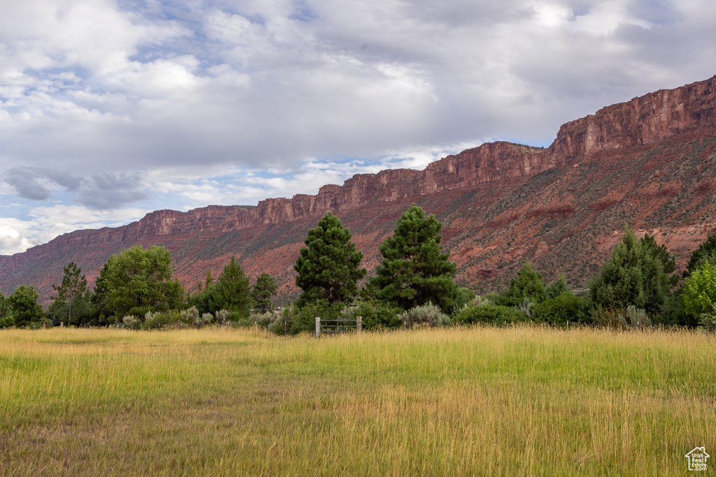 View of mountain backdrop with rural landscape