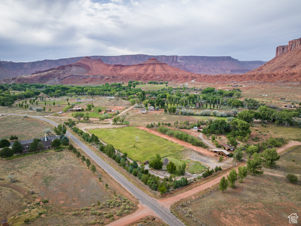 Aerial view of property's location featuring mountains and rural landscape