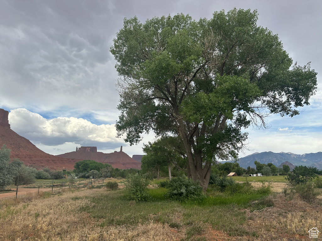View of mountain background featuring rural landscape