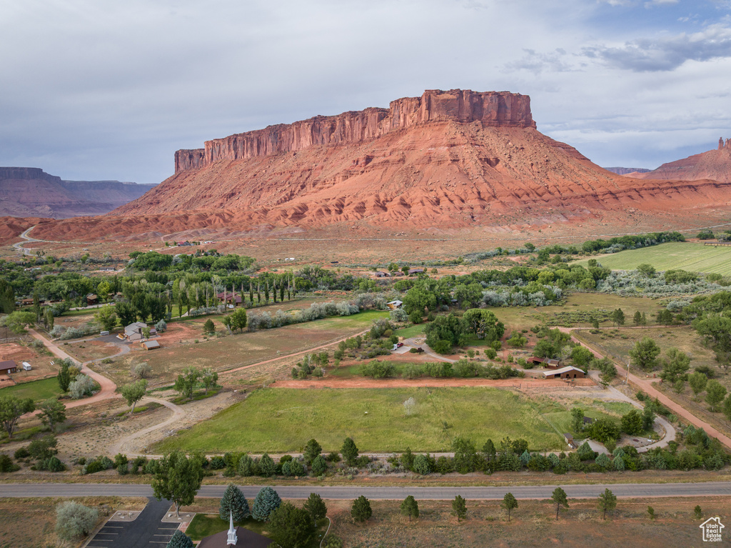 View of mountain background featuring rural landscape