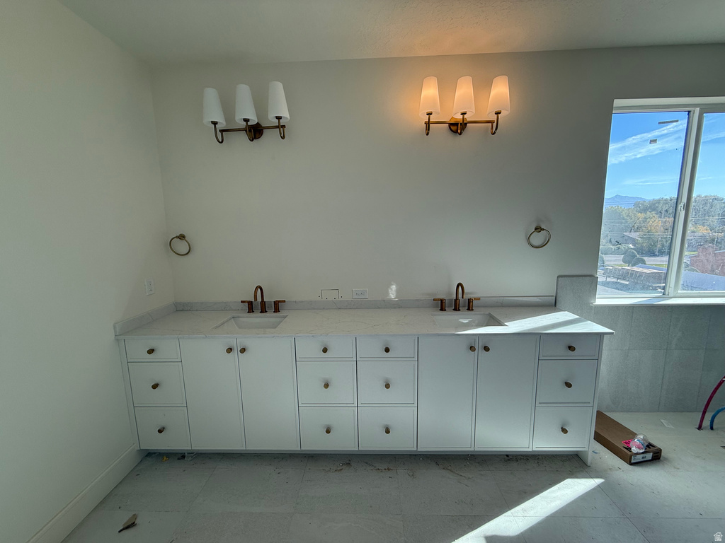 Full bathroom with double vanity
