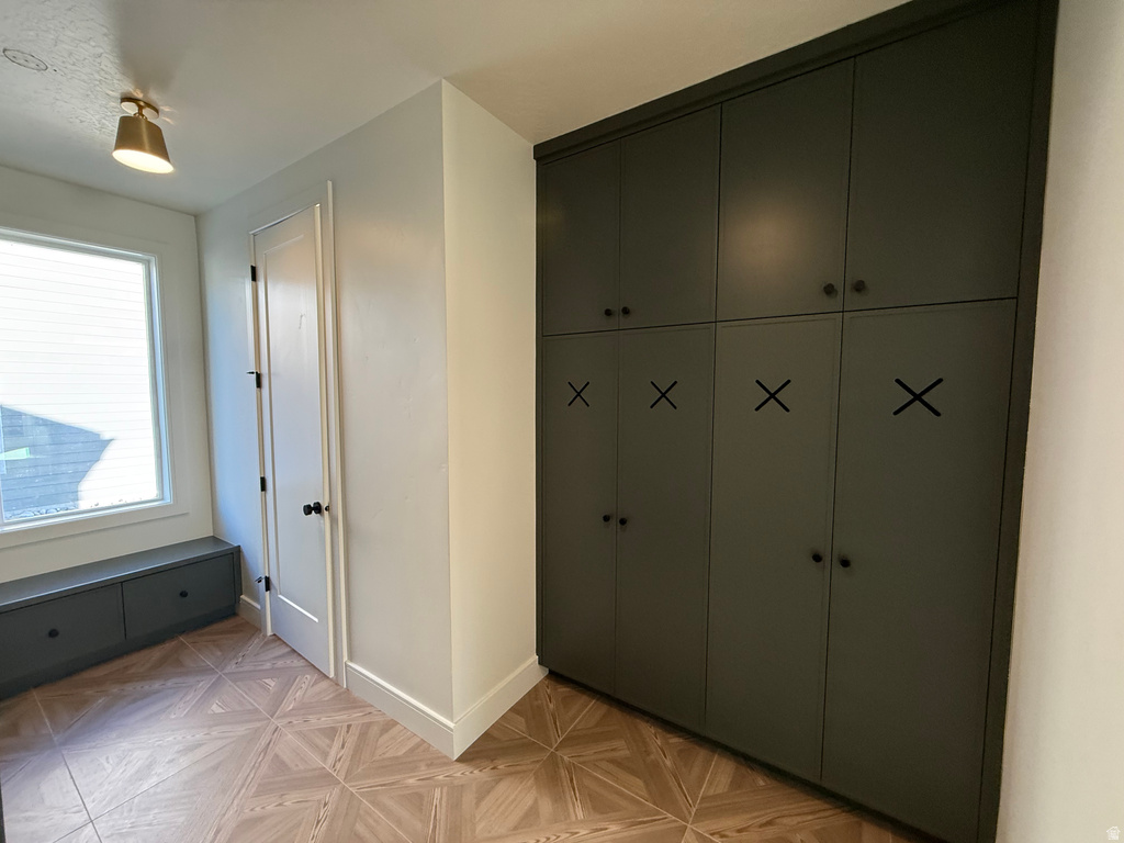 Mudroom featuring baseboards