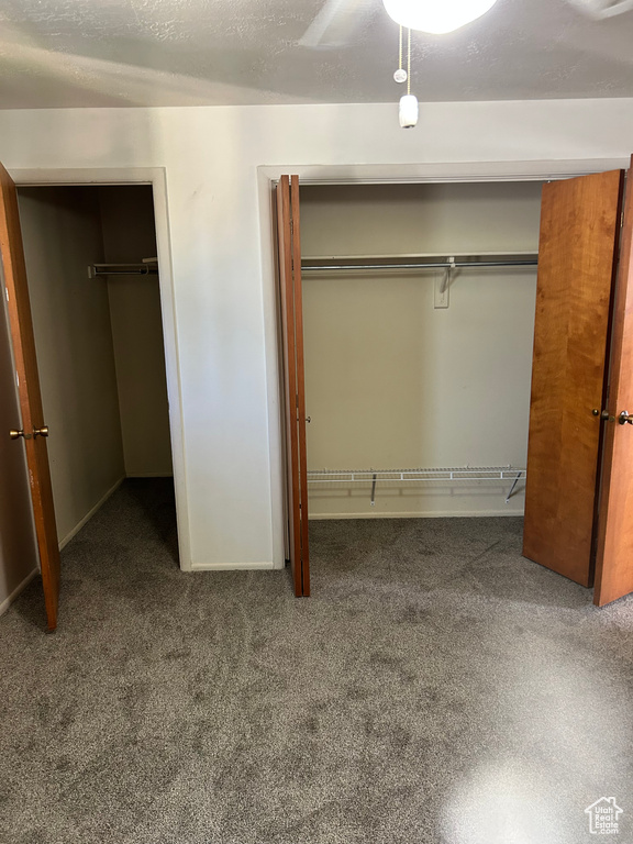 Unfurnished bedroom with carpet