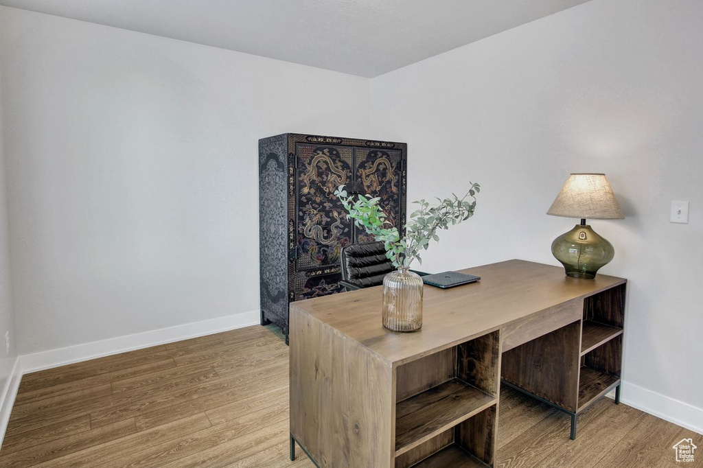 Office area featuring wood finished floors