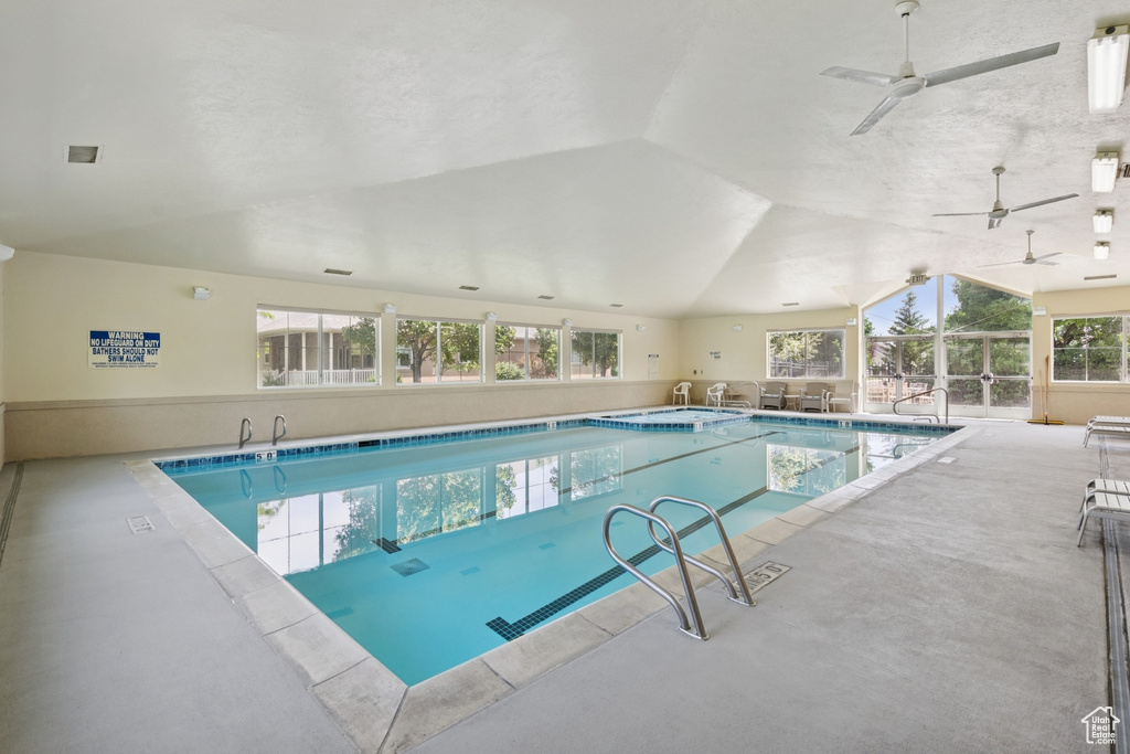 Indoor pool with a ceiling fan