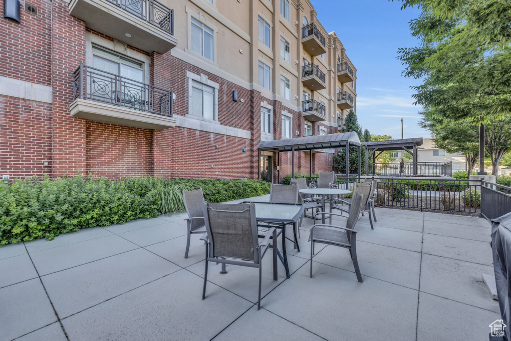 View of patio with outdoor dining area