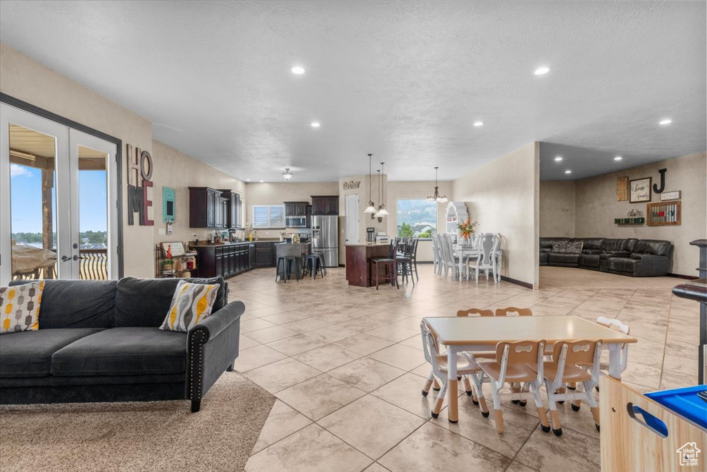 Living room featuring recessed lighting and light tile patterned floors