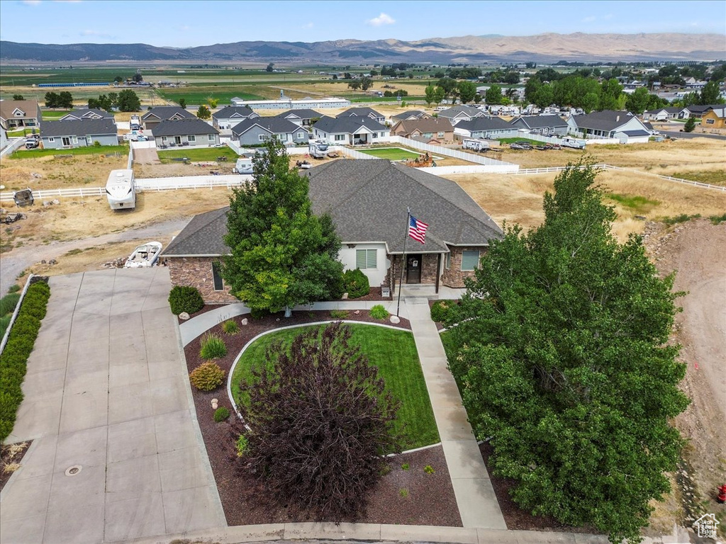 Aerial view of residential area with a mountain backdrop