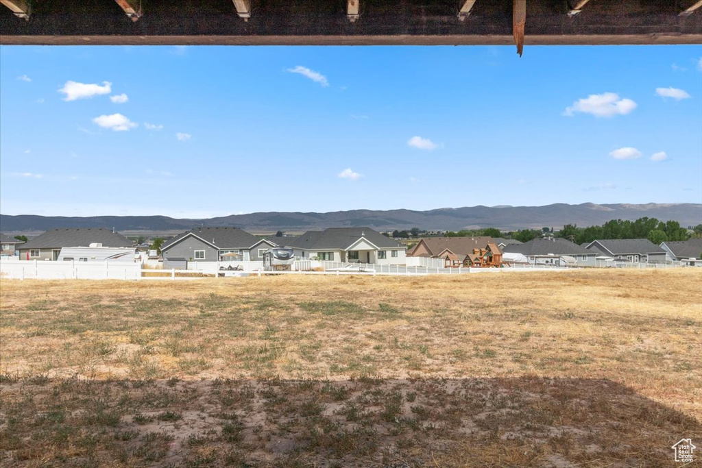 View of yard with a mountain view and a residential view