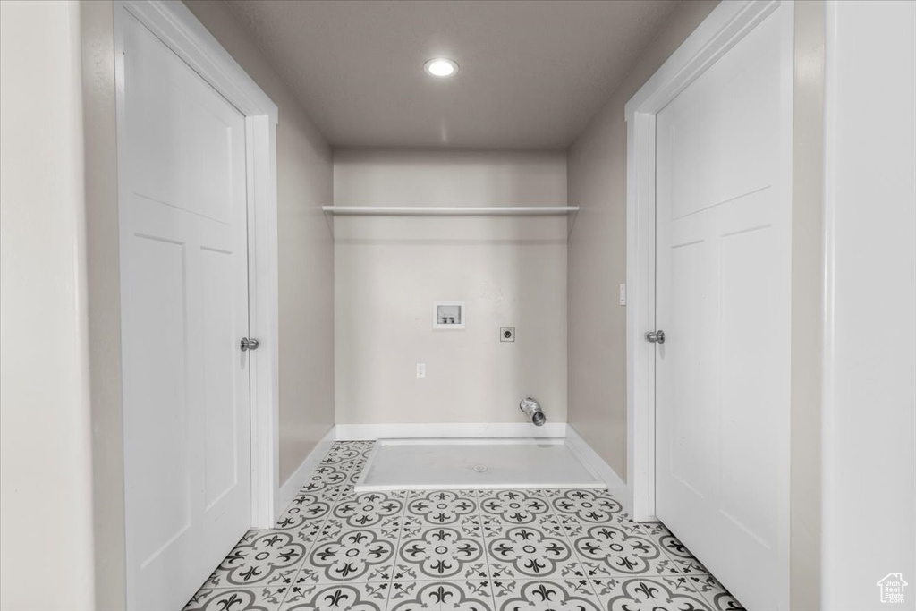 Washroom featuring washer hookup, hookup for an electric dryer, hookup for a gas dryer, and recessed lighting