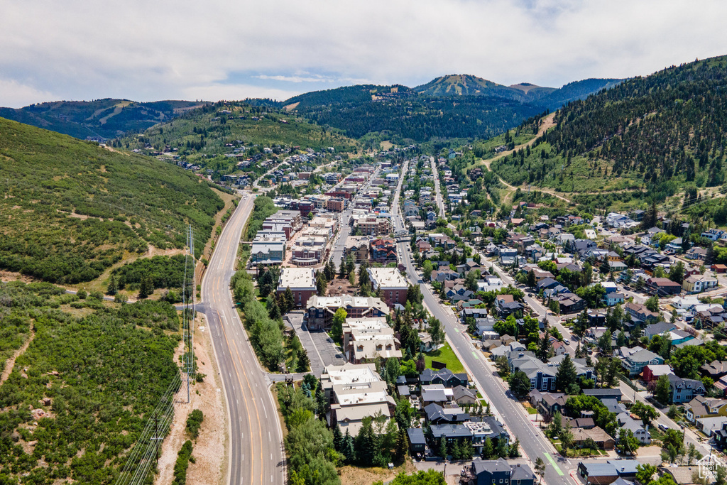 Aerial view of property's location featuring nearby suburban area