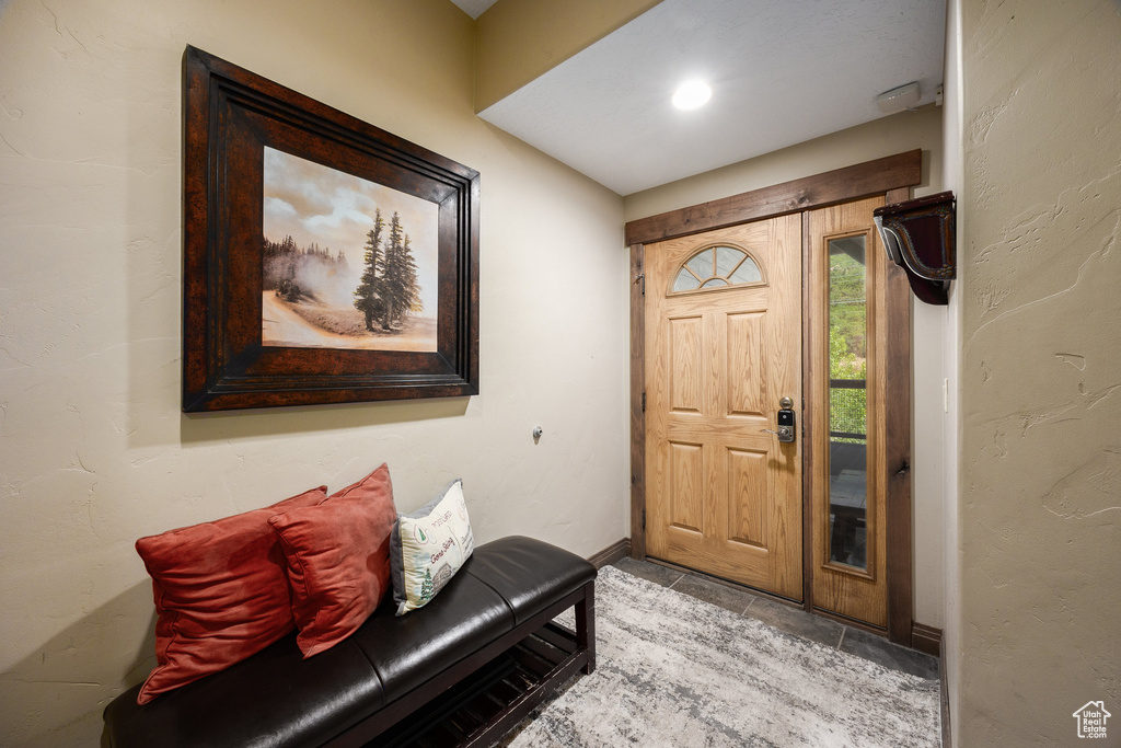 Foyer featuring baseboards