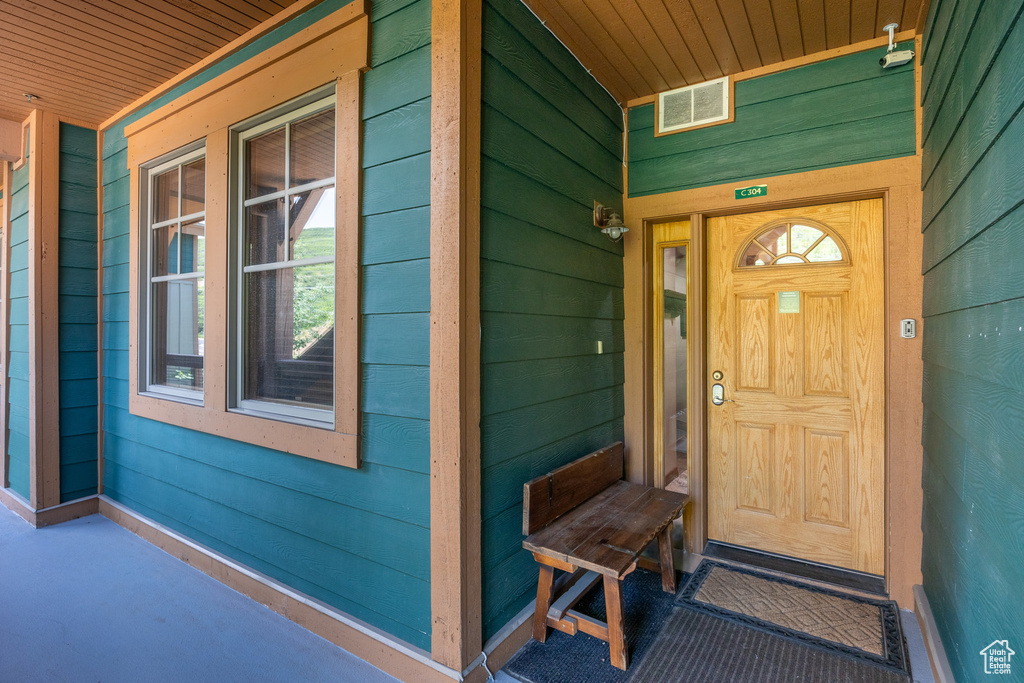 Entrance to property with covered porch