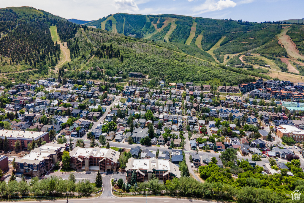 Aerial view of residential area with a mountain backdrop