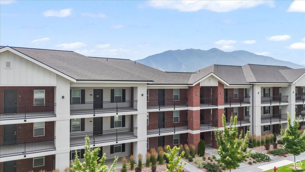 View of building exterior with a mountain view