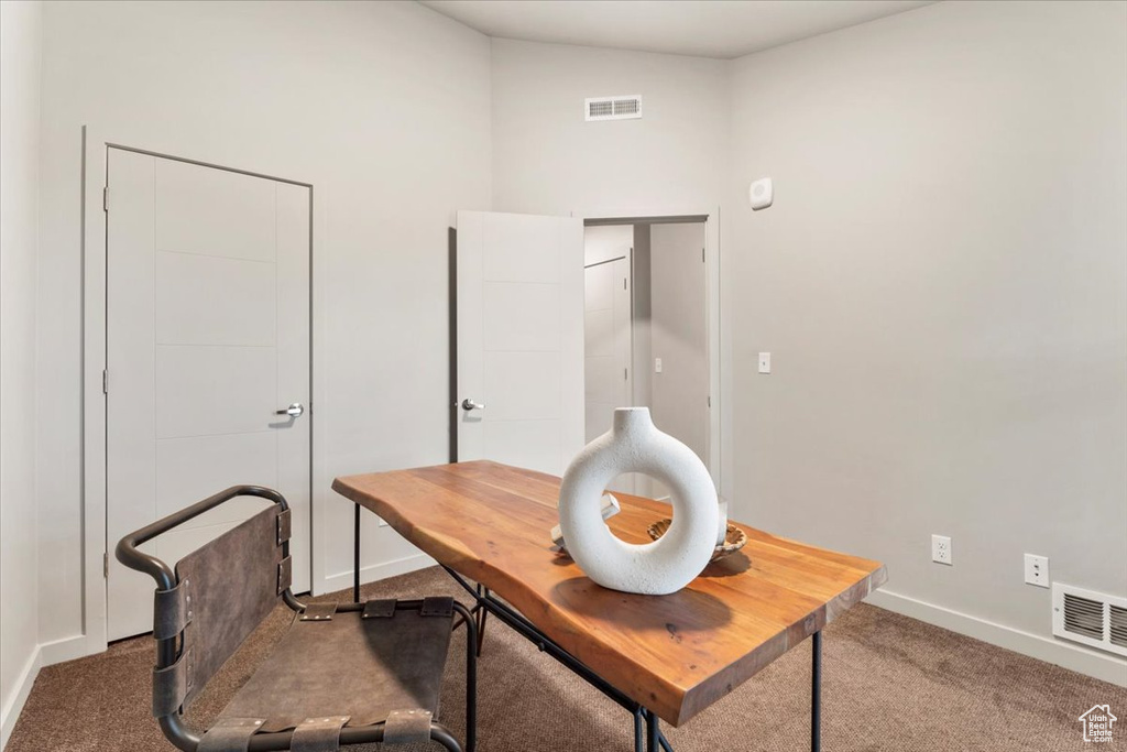 Office with carpet and baseboards