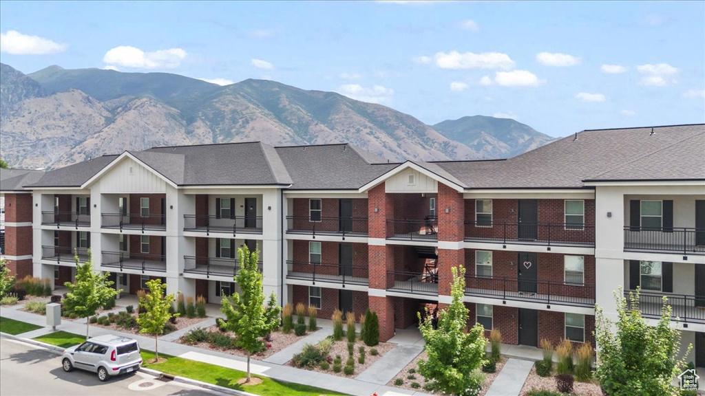 View of apartment building / complex with a mountain view
