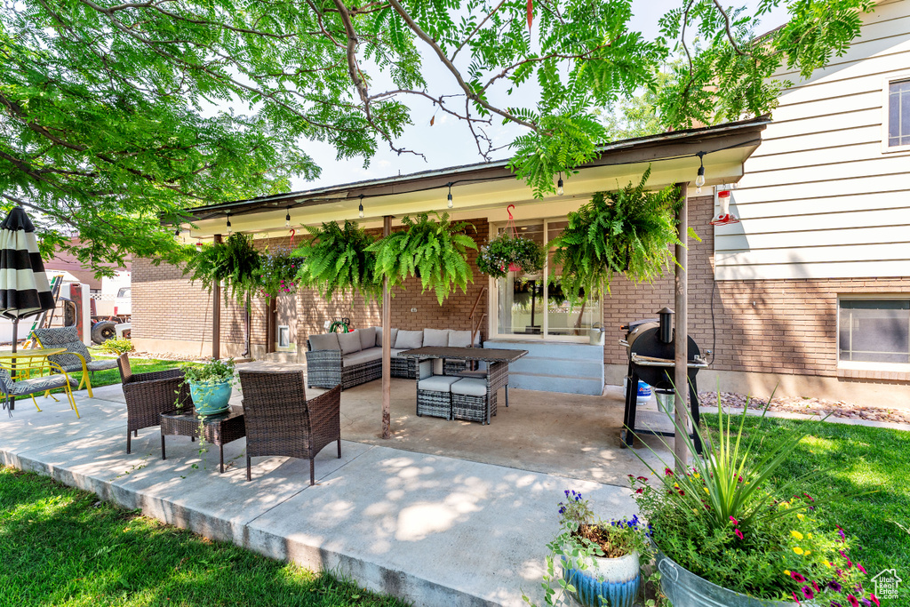 View of patio / terrace with an outdoor hangout area and grilling area