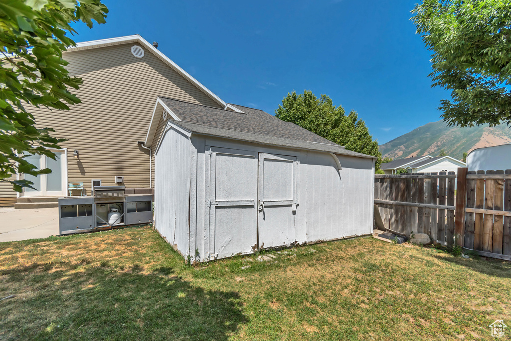 View of shed featuring a mountain view