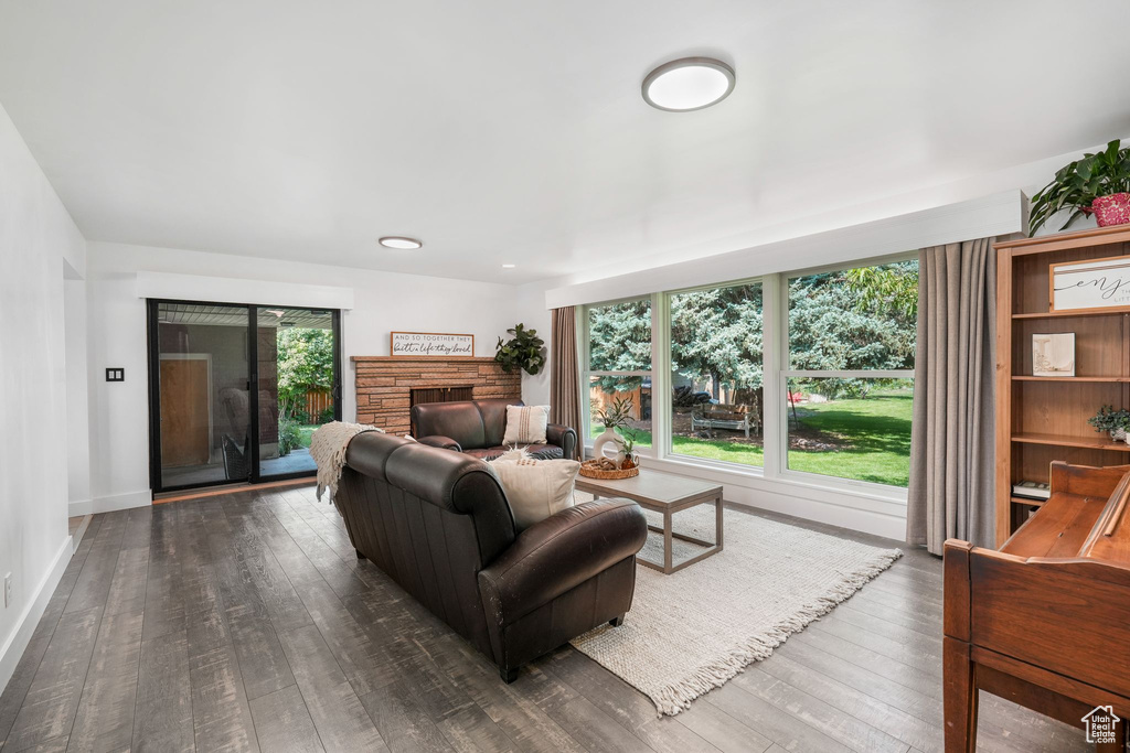 Living area with hardwood / wood-style floors
