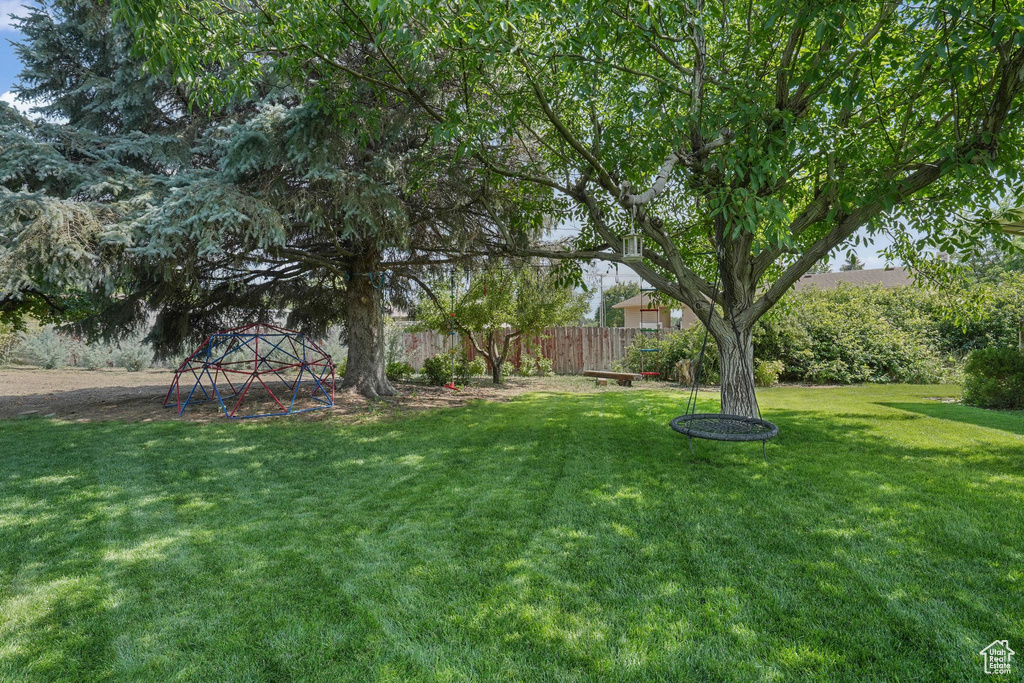 View of yard with a playground