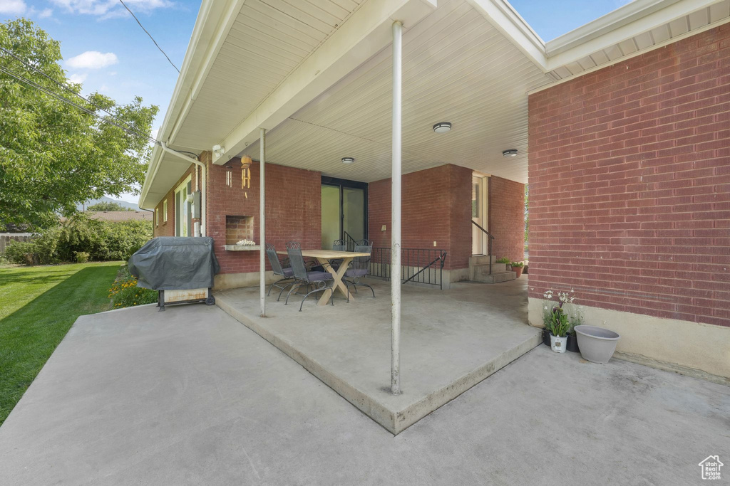 View of patio / terrace with grilling area and entry steps