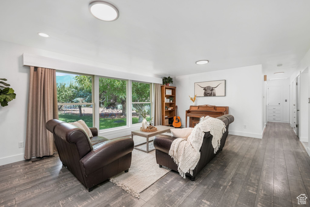 Living area with hardwood / wood-style flooring