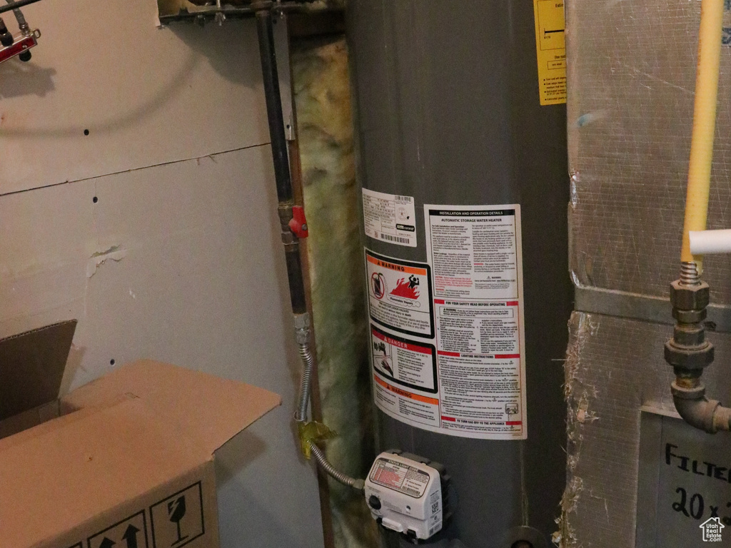Utilities with strapped water heater