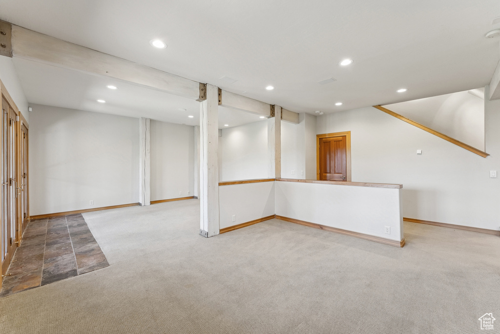 Below grade area with carpet and recessed lighting