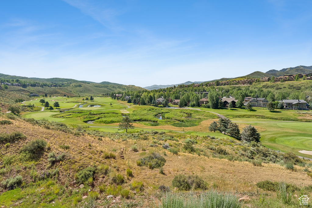 View of mountain background featuring a golf club