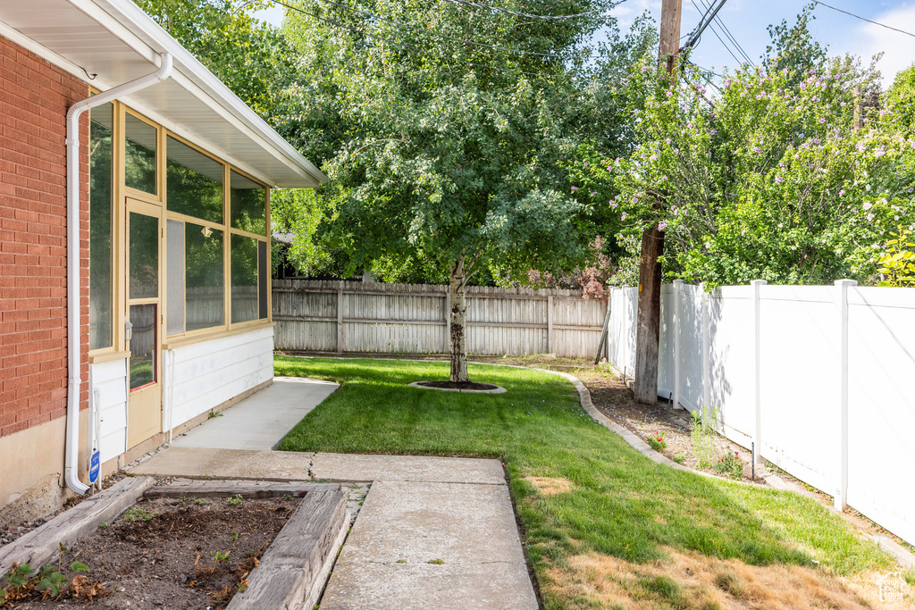 View of fenced backyard