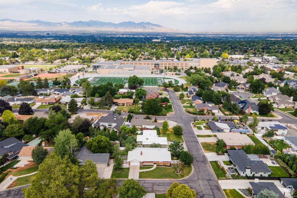 Aerial view of residential area with a mountain backdrop