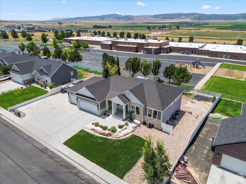 View from above of property with a mountainous background