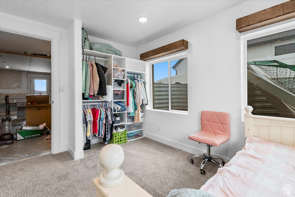 Bedroom with carpet floors and a closet