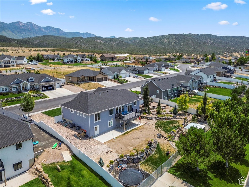 Aerial perspective of suburban area featuring mountains
