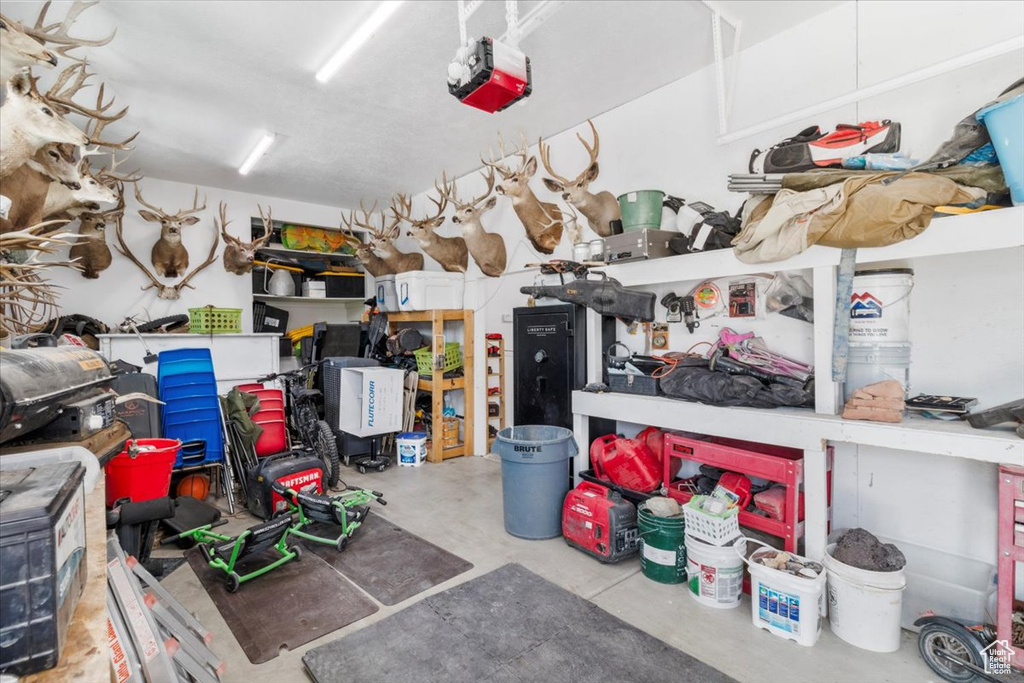 Garage featuring a garage door opener
