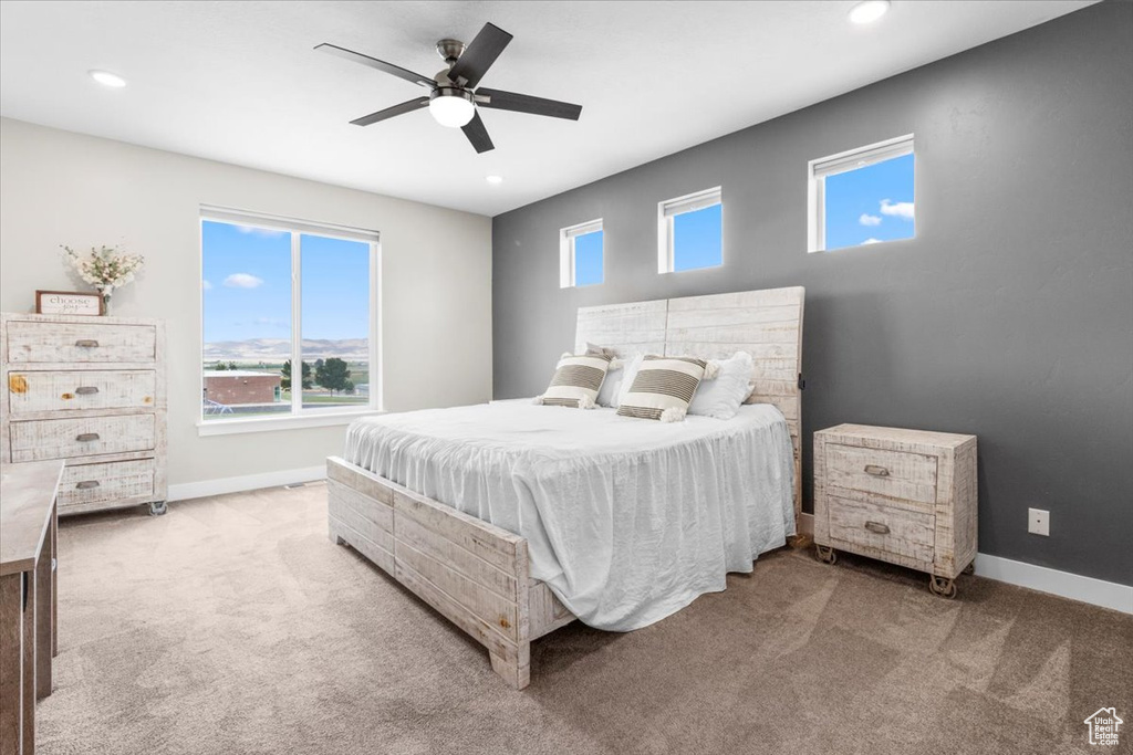 Bedroom with carpet flooring, recessed lighting, and a ceiling fan