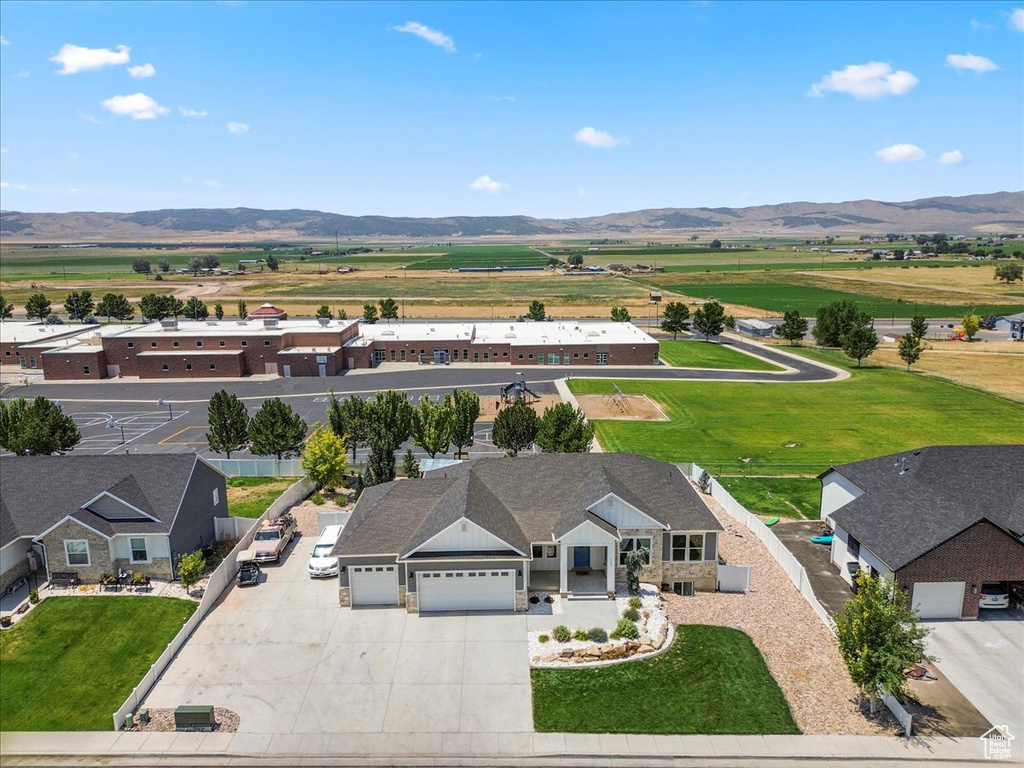 View from above of property featuring a mountainous background