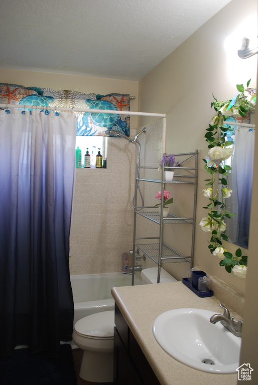 Full bathroom with vanity and shower / bath combo